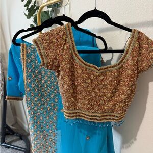 Heavily embellished sari with two blouses